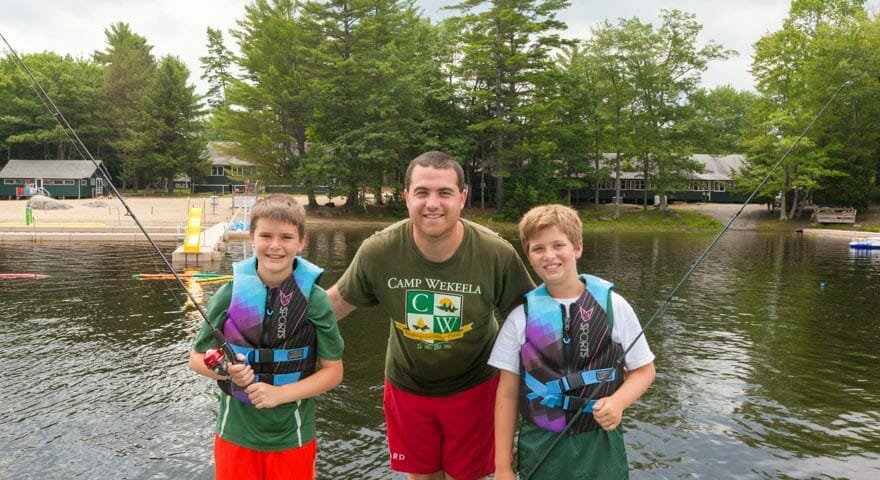 Boys fishing at American summer camp